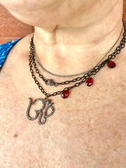 Oxidized "OHM" Necklace with Garnet Accents