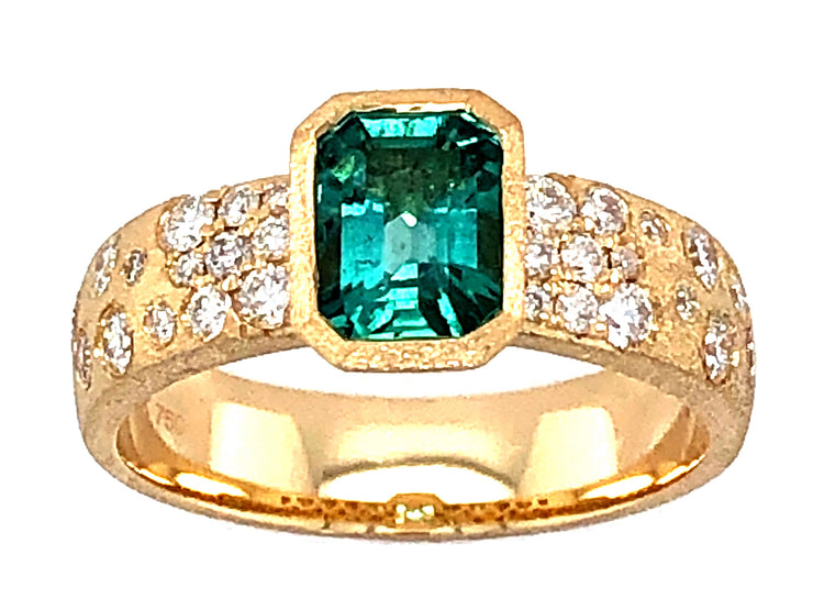 Wide Emerald Ring with Scattered Diamonds